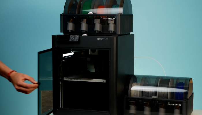 Image displays BambuLabs P1S 3D printer with various AMS systems